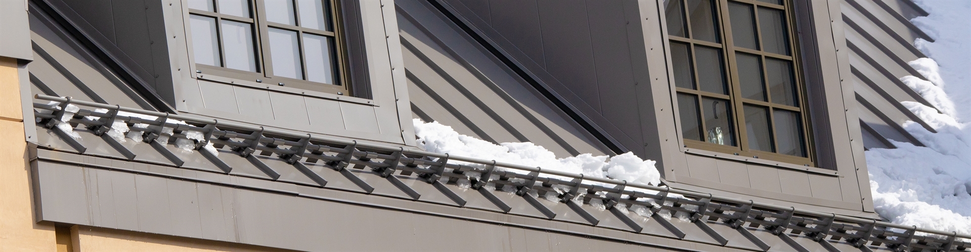 installing snow guards for metal roofs