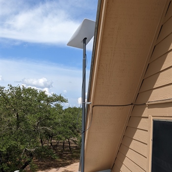 Starlink antenna installation on metal roof