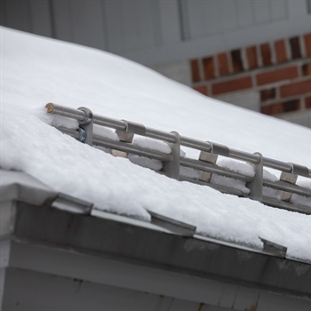  AceClamp snow retention for commercial buildings to protect walkways