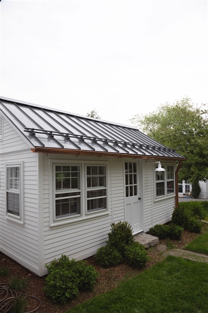 Stylish powder-coated metal roof snow stops chosen by homeowner