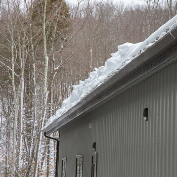 GCI Outdoor facility with Color Snap snow rails for metal roofs